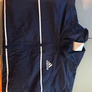 Adidas young women’s windbreaker navy blue